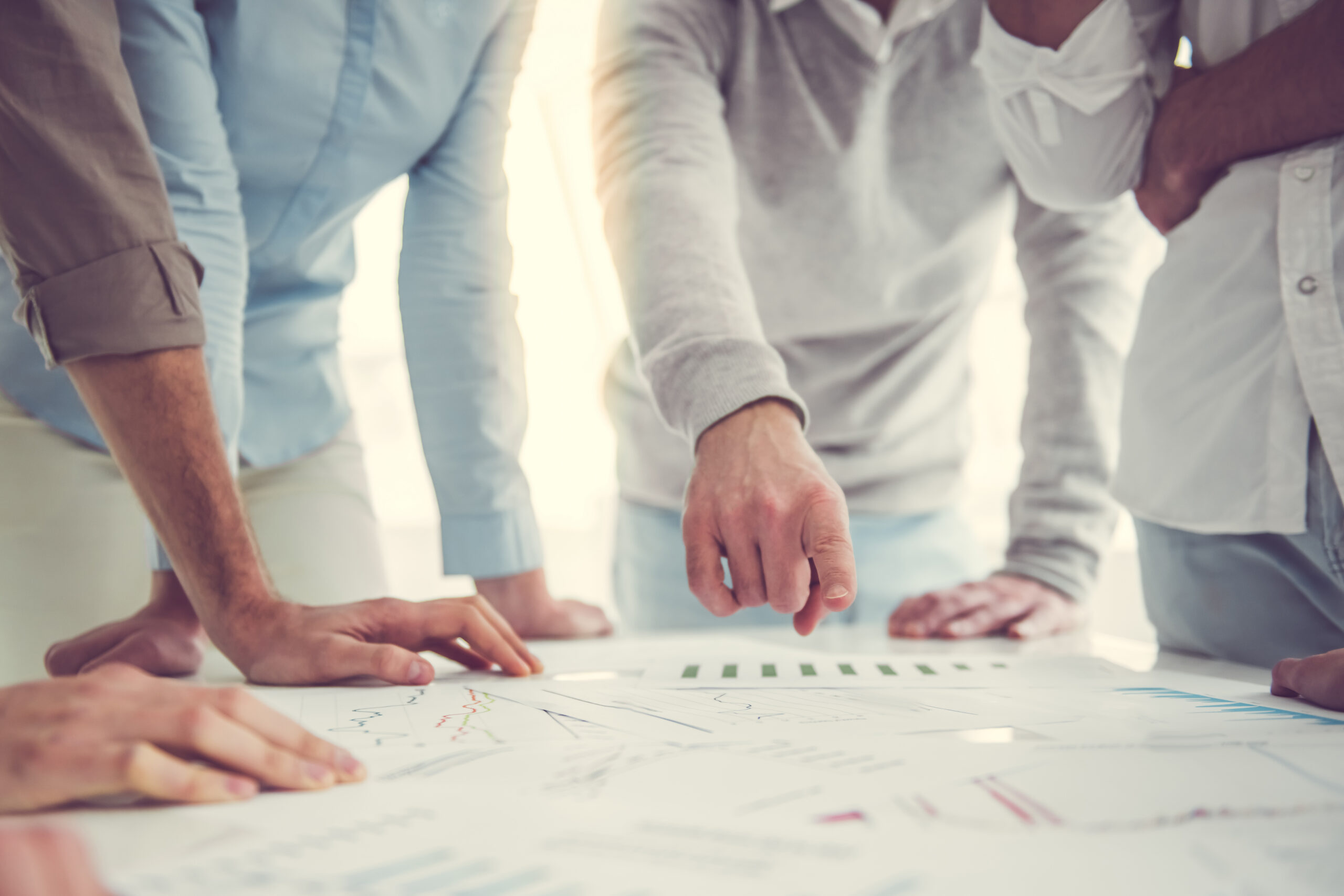 A group of people discussing a professional growth plan